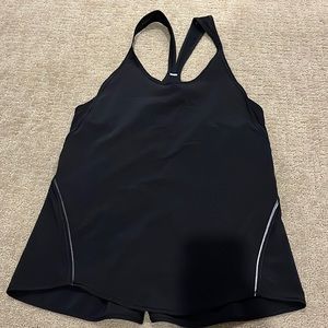 Black lululemon tank in athletic material with reflective accents